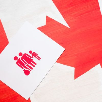Family flashcard on the top of canada flag