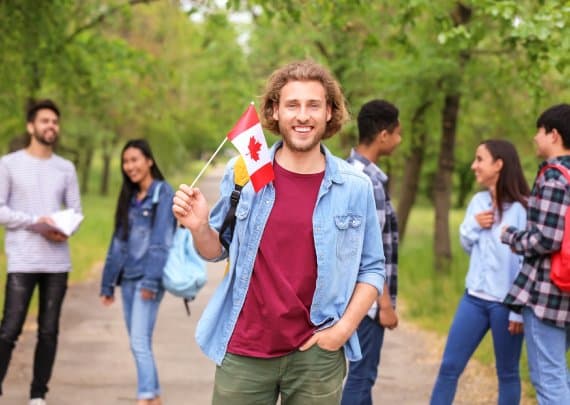 young student canadian flag outdoors