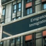 street sign direction-wa emigration immigration