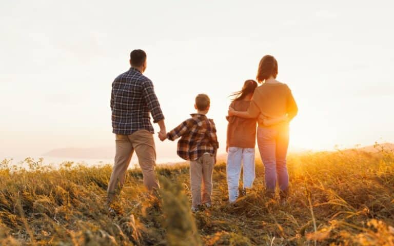 Happy Family Outdoors in Nature - Family Sponsorship