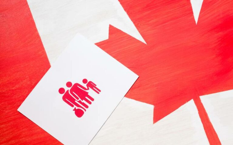 White card featuring family icon, Canada flag