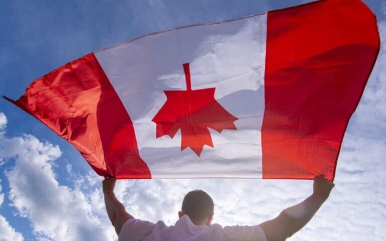 Proud man waves Canada’s iconic flag