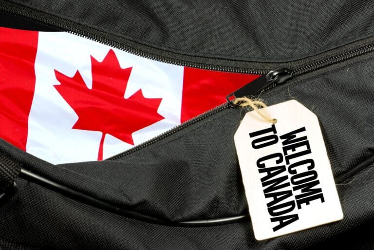 Travel bag with Welcome to Canada sign display